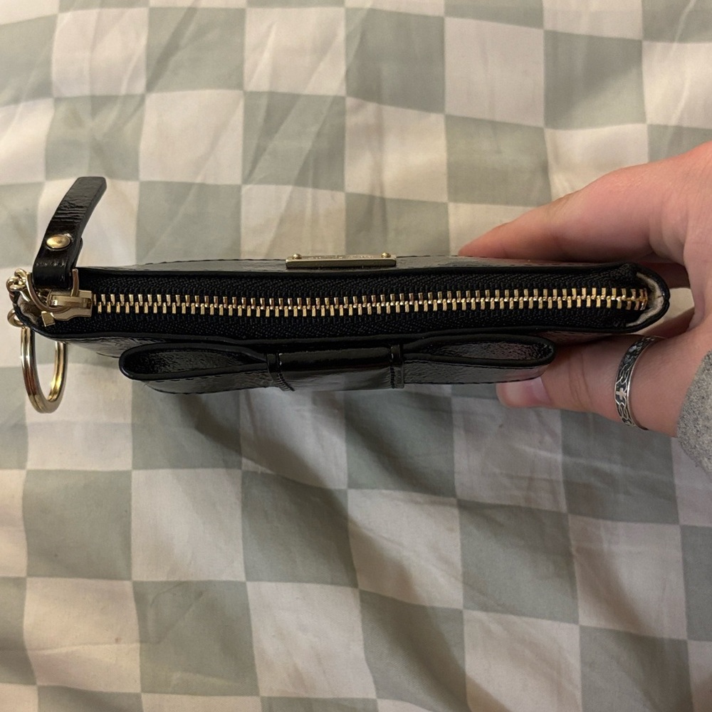 Kate Spade Glossy Black Leather Wristlet with Gold Ring — Storybook Lining - Picture 13 of 16